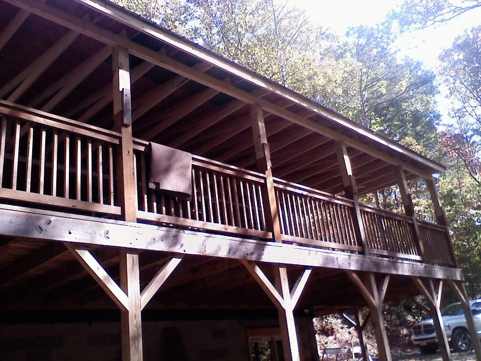 Timber framing under a new elevated porch and deck — Roof Leak Repair in Cuyahoga Falls by Roofing Brothers